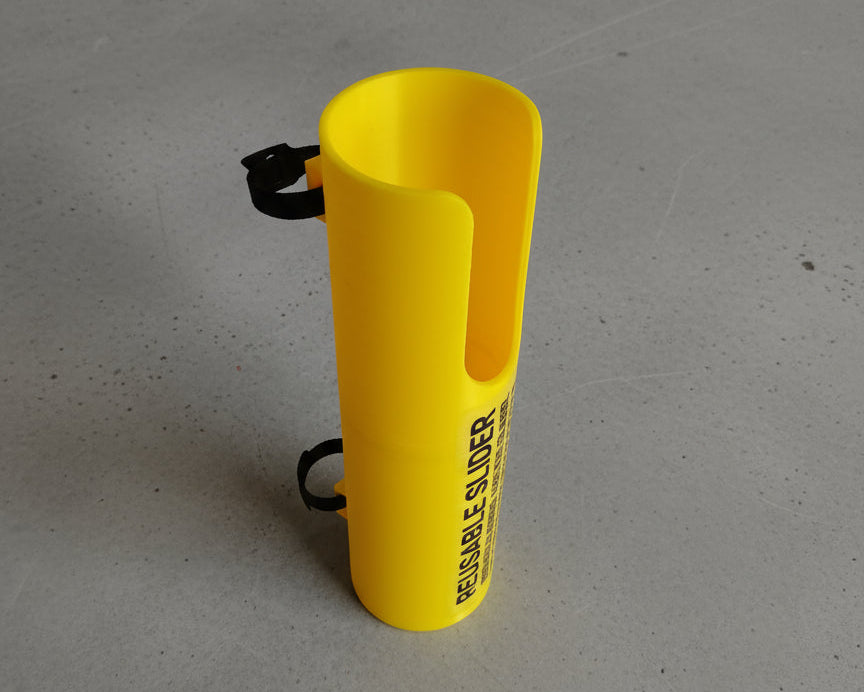 Yellow handle attached to a white mattress with text on it.